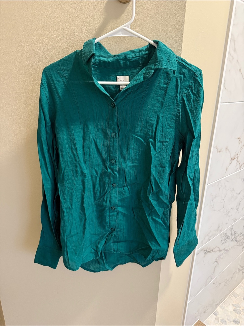 Size small green woman’s button up
